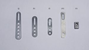 Different position sensor holders (j) - (m) and 90° block (n)